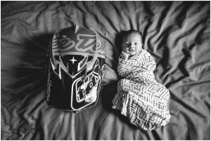 newborn baby and motorcycle helmut